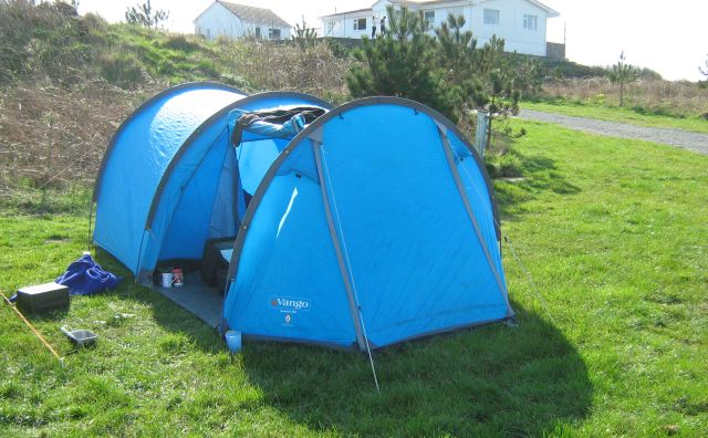 my blue vango tunnel tent in the sunshine on a campsite